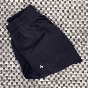 black lululemon tracker shorts